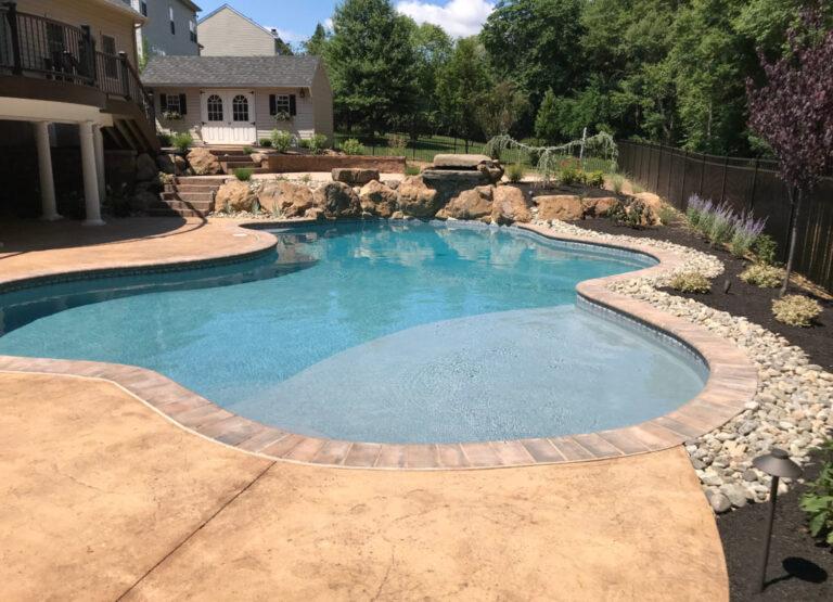 natural pool stamped concrete pool deck 1024x740 1