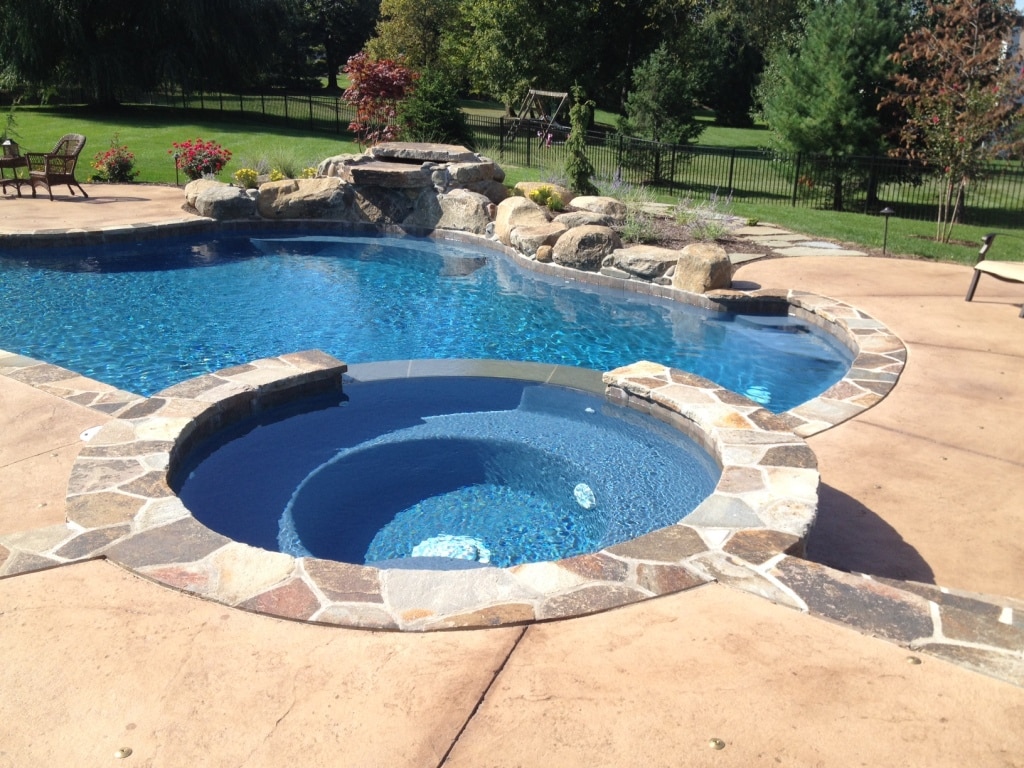 Infinity pool with scenic Pennsylvania hillside views.